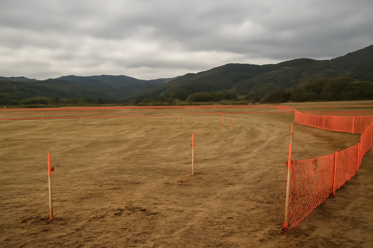 Graded construction lot with utility stakes